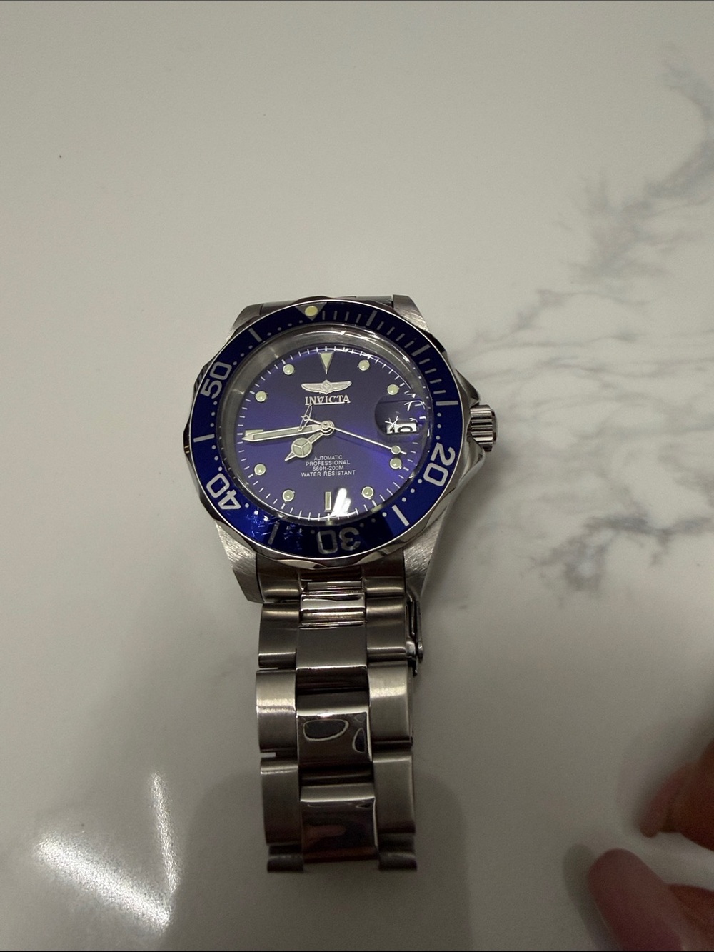Invicta Men's Silver Stainless Steel Watch with Blue Dial and Bezel